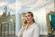 © Victor Bordera/Stocksy - finance business woman talking on phone