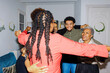 © BONNINSTUDIO/Stocksy - Happy multi generational family hugging at home