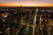 © VICTOR TORRES/Stocksy - Aerial view of NYC at sunset with illuminated skyscrapers