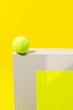© Colour Laboratory/Stocksy - Bright neon yellow still life image of geometric objects of materials