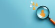 Yellow human icon in magnifying glass among white icons on blue background symbolizing customer focus hr recruitment and crm management banner with space for copy and orange accents
