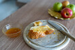 © Inna Reznik/Stocksy - Honey-Spread Challah Slice For Rosh Hashanah Celebration