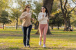 © daniromphoto - Women jogging in a sunny park, staying active and enjoying a healthy outdoor lifestyle
