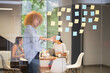 © koganami studio/Stocksy - Team brainstorming in modern office