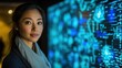 © BlackBird Studio - Contemplative Woman in Front of Digital Data Display