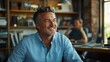 © BlackBird Studio - Smiling Businessman in Modern Office Setting