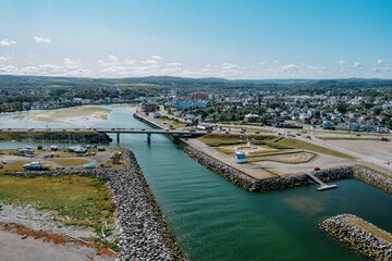 Wall Mural - Matane River flowing in from the St Larence River, Matane, Quebec, Canada.