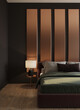 © Viktoriia Lytvyn/Stocksy - Premium design bedroom in hotel. Minimalist dark gold room