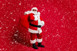 © deagreez - Full length body size view of cheerful bearded Santa father carrying delivering bringing big sack gifts newyear winter sale discount delivery isolated bright vivid shine vibrant red color background