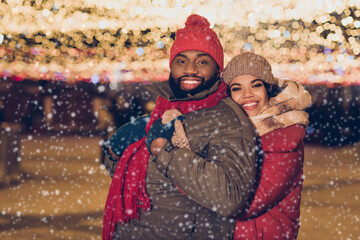 Profile portrait of two idyllic lovely people cuddle toothy smile enjoy advent atmosphere illumination indoors