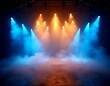© Jittiwan - Concert stage with yellow and blue spotlights and foggy dried ice