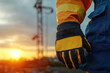 © photobuay - Safety gear with gloves at sunset, showcasing protection and readiness