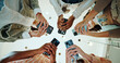 © peopleimages.com - People, circle and phones for university registration, online and teamwork in education on campus. Students, low angle and huddle for project solidarity in college, collaboration and united learning
