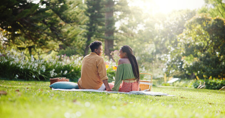 Back, relax and love with black couple and picnic for bonding, happiness and romantic date. Calm, support and conversation with man and woman at park for commitment, valentines day and summer