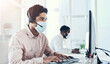 © peopleimages.com - Business, mask and telemarketing with man, call center and computer with headphones. Face cover, employee and agent for help desk, consulting and policy for workplace healthcare compliance or typing