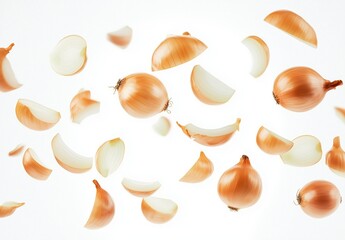 Wall Mural - Onions falling through the air against a bright white background