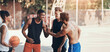 © peopleimages.com - Outdoor, man and happy with handshake as basketball players for teamwork or unity at court. People, friends and smile for sports as teammates for solidarity, support and trust for tournament or match