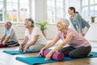 © SerPak - A group of seniors engages in a gentle yoga class, practicing flexibility and relaxation techniques. They use mats and props in a bright, spacious studio filled with natural light, promoting a serene