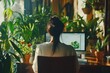 © ABDUL - Woman Working Among Indoor Plants in Sunlit Room