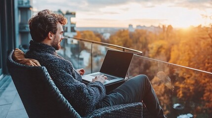 Wall Mural - Individual working from a hotel balcony with a laptop overlooking a beautiful landscape representing the freedom to work remotely from any location Teleworking concept with side empty space for text