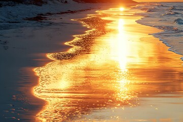 Wall Mural - Golden sunset reflecting on calm beach sand and waves