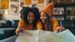 © dominic - Two Smiling Girls Planning Travel Adventure With Map