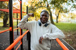 © Marko Geber - Portrait of a senior man exercising at outdoor fitness park in autumn