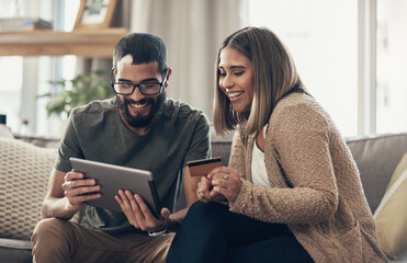home, couple and smile with credit card on tablet with payment for accommodation or flight tickets f