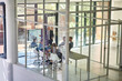© peopleimages.com - Business man, meeting and presentation in office for planning, progress or revenue with top view. Team, workshop and executive employee for project feedback, kpi stats or financial report with screen
