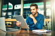 © peopleimages.com - Man, tablet and reading at cafe in morning with inspiration, review or ideas for remote work. Person, writer or editor with touchscreen, reflection and application for creative project at coffee shop