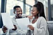 © peopleimages.com - Home, black couple and discussion with paperwork on sofa for finance plan or interest rate on loan application. Apartment, people and smile with documents on couch for bank statement and credit score
