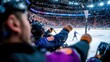 © DKPhoto - A thrilling ice hockey game unfolds as players compete fiercely on the rink, while enthusiastic fans clad in jerseys cheer passionately from the crowded stands.