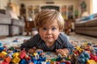 © Yuliia - Energetic Toddler Boy Creates Chaos in Living Room with Playful Mischief
