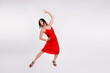© deagreez - Full length photo of stunning adorable lady dressed sexy red outfit enjoying ballet dance empty space isolated white color background