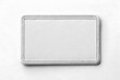 © Mike Mockup - Blank rectangular fabric patch mockup with stitched border on white background, perfect for branding design.