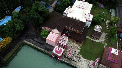 Poster - Shree Rameshwar Mandir, Chaul surrounded by greenery in Revdanda, India with waterfront