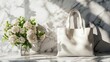 © Elkhan Babayev - White tote bag on marble table mockup