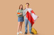 © Pixel-Shot - Students with flag of Canada, notebooks and backpack on brown background