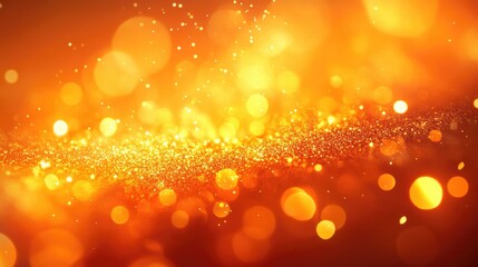 Leinwandbilder - Abstract defocused background with vibrant orange tones featuring bright bokeh and glitter effects Ideal for holiday themes and celebrations