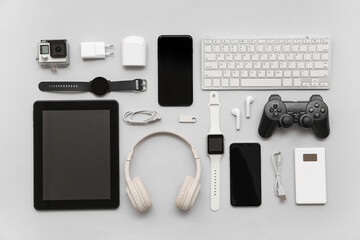 Wall Mural - composition with various modern devices on grey background