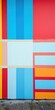 © Kingphet - Wall with vibrant blue, red, and yellow stripes, geometric, pattern