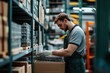 © Maryono - Warehouse Worker Picking Up Supplies