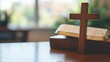 © Iswanto - A wooden cross rests on an open Bible, symbolizing faith and spirituality.