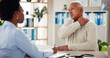© peopleimages.com - Woman, doctor and senior man with shoulder pain, checkup or medical advice at clinic consultation. Help, healthcare professional and elderly patient in office with neck cramp, muscle injury or ache