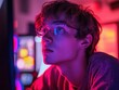 © Aashutosh Pandit - A thoughtful young person gazes intently in a colorful, neon-lit environment