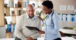 © peopleimages.com - Hospital, clipboard and doctor with old man for consulting, medical service and diagnosis. Healthcare, clinic and woman with senior patient with paperwork for medicare, insurance and prescription