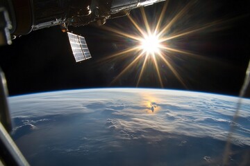 Wall Mural - Stunning view of the earth from space with a bright sun in the background