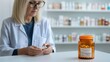 © GreenMOM - A pharmacist examines a prescription medication bottle, showcasing professionalism in a modern pharmacy setting.