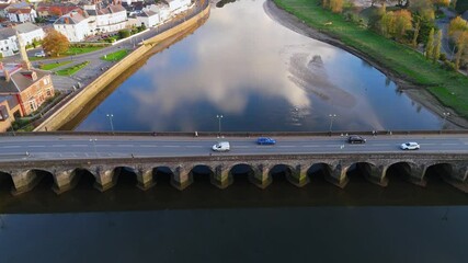 Wall Mural - Aerial 4K View of The Barnstaple Historic Long Bridge Over the River Taw in North Devon, England