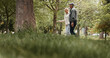 © peopleimages.com - Smile, love and walking with old couple in park for retirement, happiness and wellness. Support, date and romance with senior man and woman bonding in nature for partner, marriage and peace together